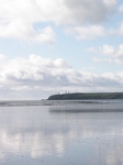 JT00873 Tramore Iron man reflected in beach.jpg